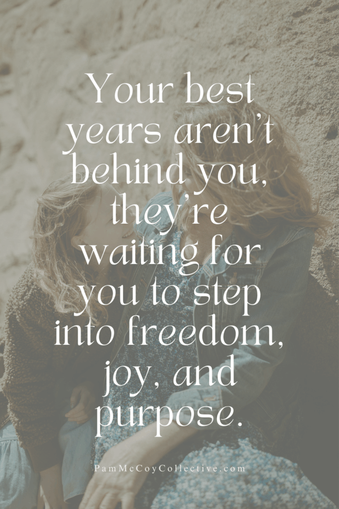 Woman sitting on a rock, looking at her granddaughter, reflecting on midlife renewal. Text overlay: “Your best years aren't behind you, they're waiting for you to step into freedom, joy, and purpose.”
