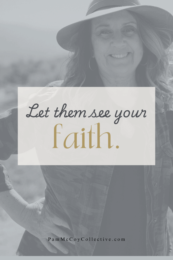 A smiling midlife woman wearing a hat, standing peacefully in natural light with the words “Let Them See Your Faith” overlaid — symbolizing trust, joy, and spiritual confidence.