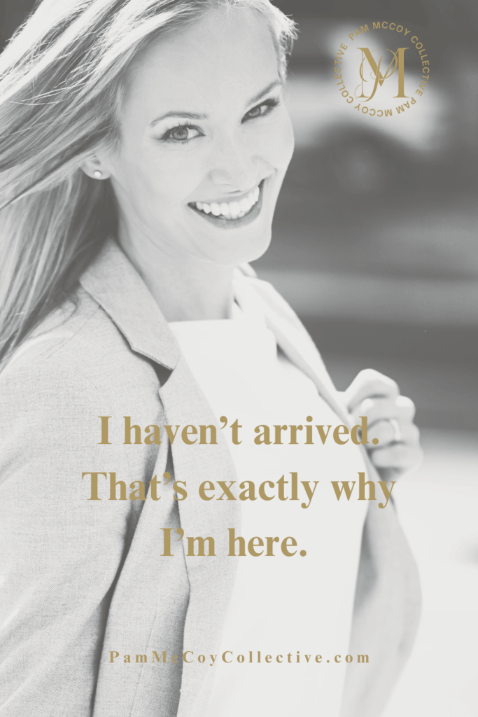 Woman in midlife smiling while walking and carrying her purse, symbolizing confidence, growth, and embracing the journey of becoming rather than having everything figured out.